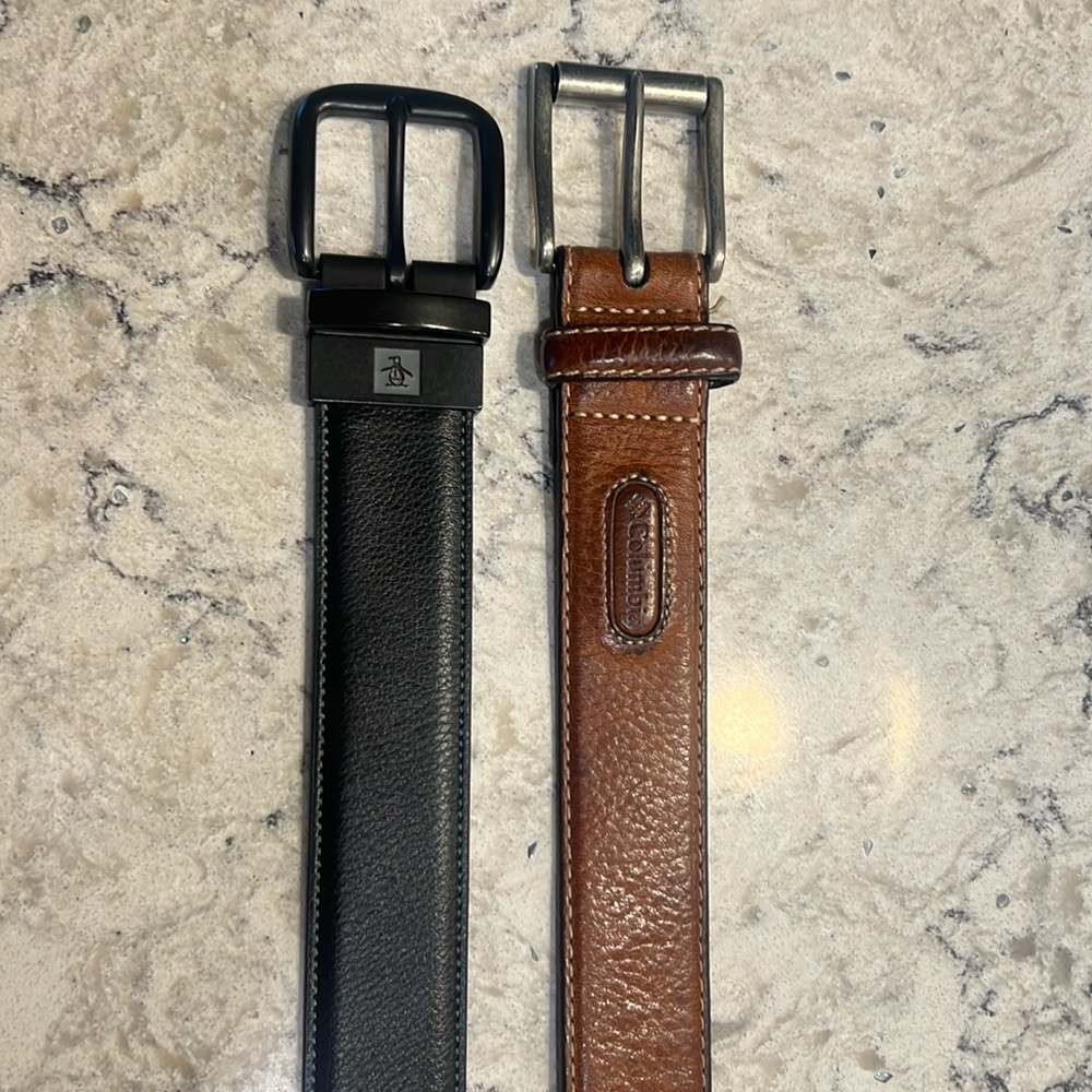 Two men’s leather belts, one black one brown size 34.